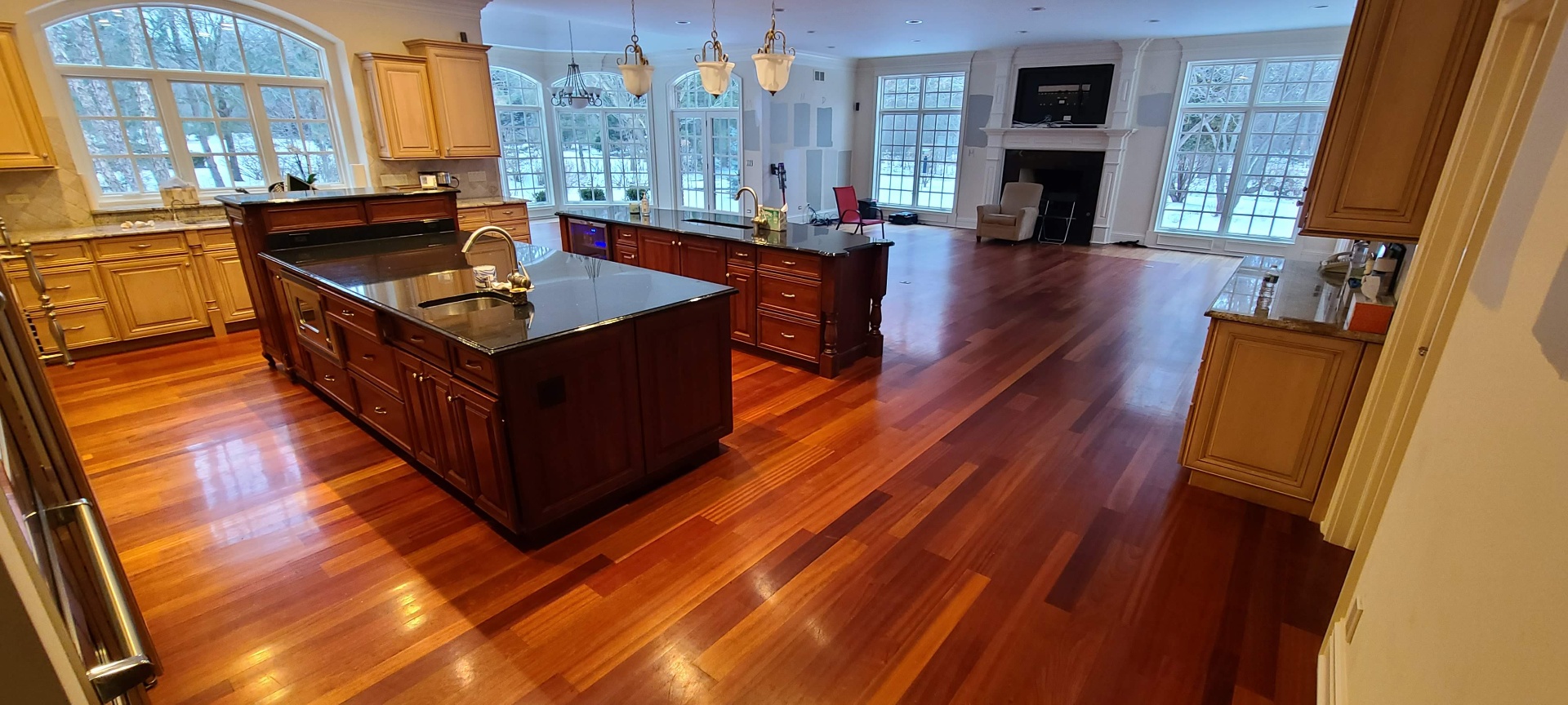 Craftsmen working on a warm wood interior remodel